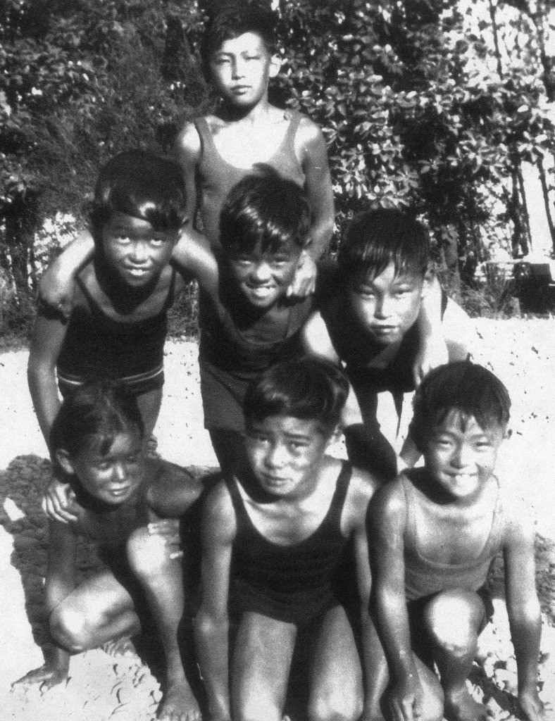 Swimming at Sandpoint in North Seattle. Back row: Yosh Hirata. Middle row (L to R): Rick Tanagi, Roy Tanagi, Ko Abe. Front row (L to R): Esther Hiyama, Kame Uyeji, George Tanagi.