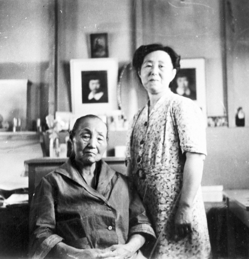 Grandma Yorozu, who at eighty-four years of age was one of the oldest Japanese Americans at Minidoka, and Fusa Yorozu inside their barracks apartment.