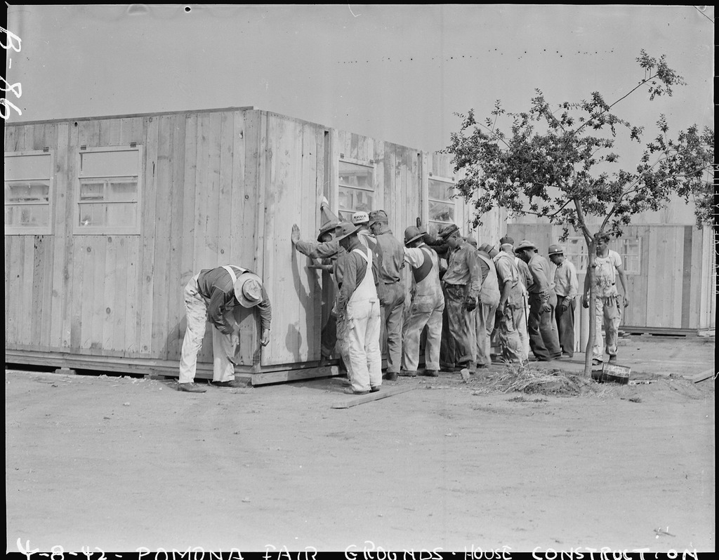 Construction crew erecting barracks at the assembly center on the Pomona fairgrounds.