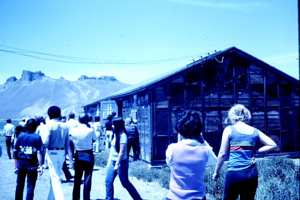 Attendees visiting the ruins of a barracks at Tule Lake concentration camp during the 1974 pilgrimage