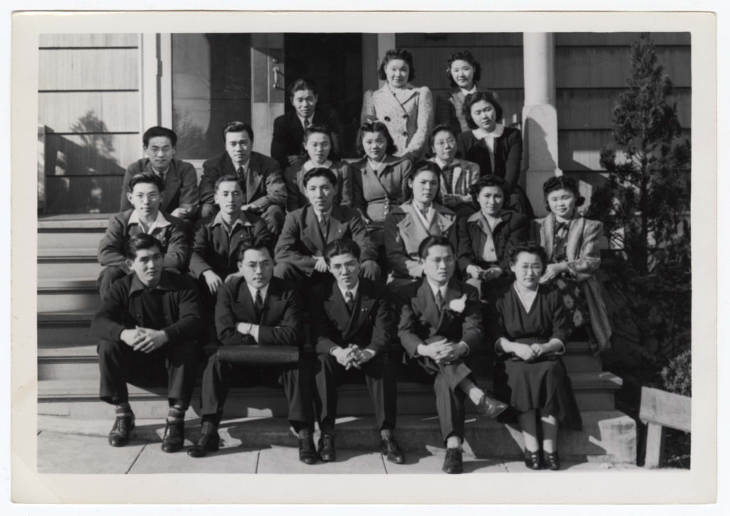 New Kibei group at Kendo Hall (now the Nisei Veterans Committee Memorial Hall), c. 1941-42. Reverend Terao of the Seattle Betsuin Buddhist Temple is seated in the front row, second from left.