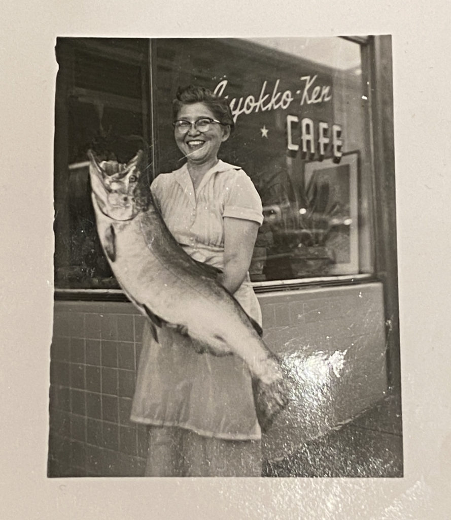 Lauren Ito's grandmother holds a fish