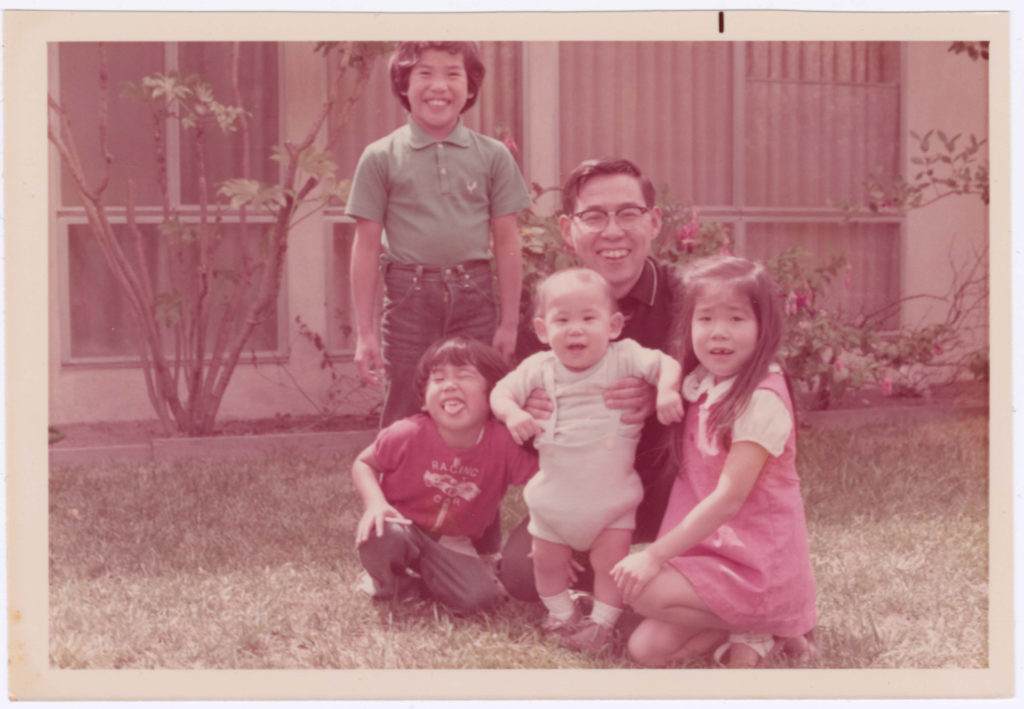Lawrence Miwa and his children in their backyard in California in 1970.