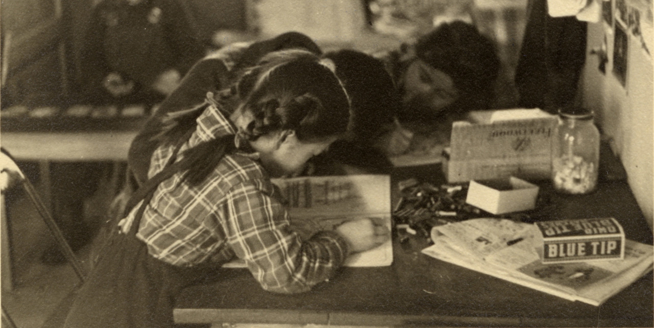 Children reading at a table