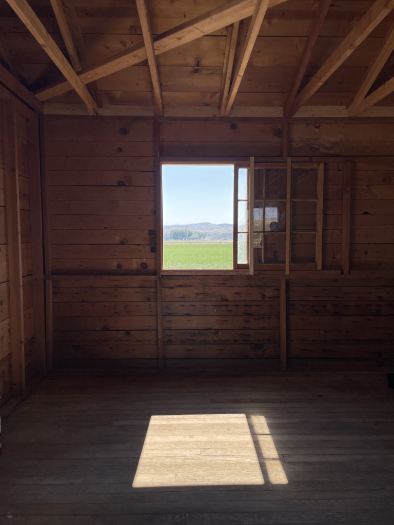 A view of the Heart Mountain landscape from within the barrack.
