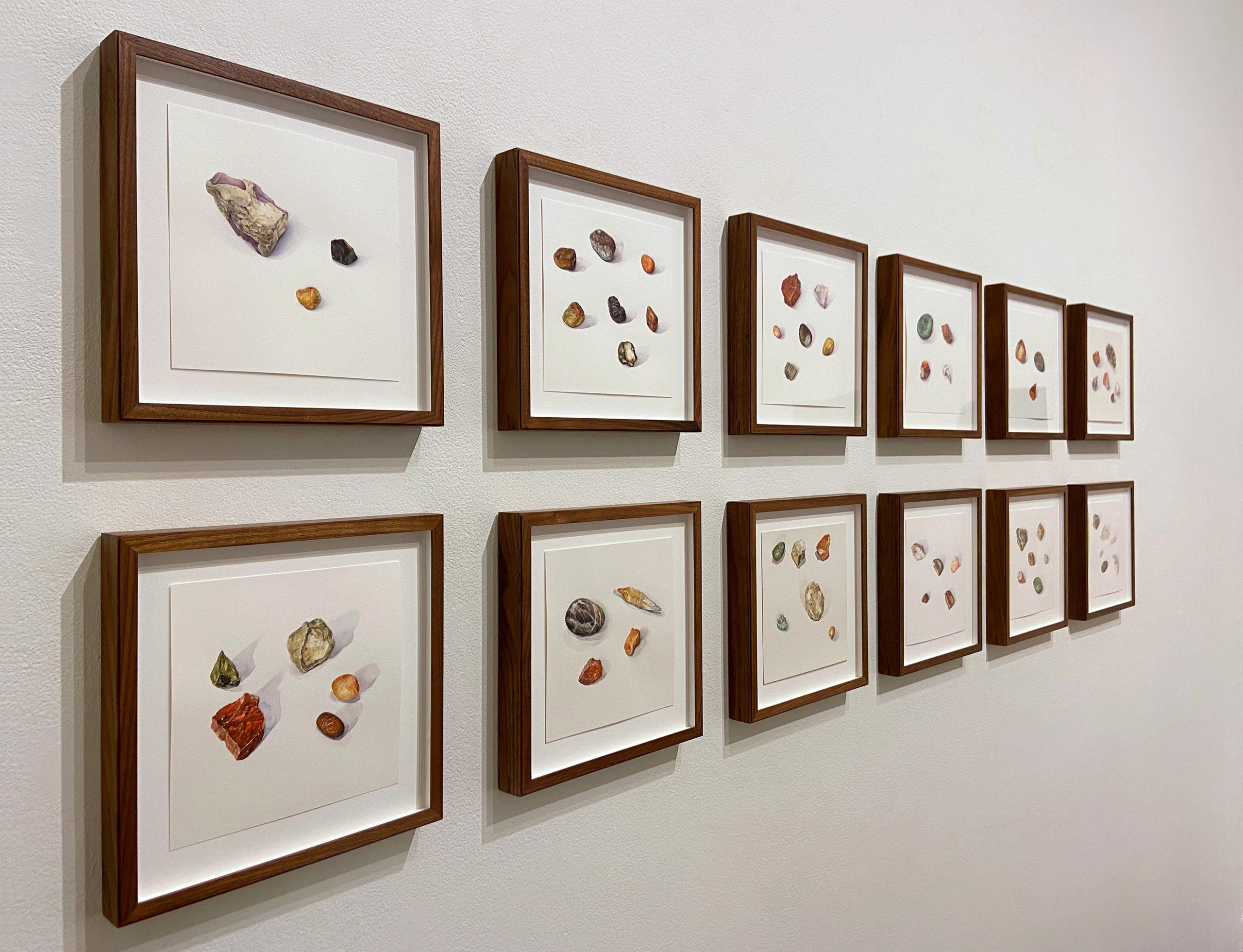 Watercolor paintings of the rocks collected by Alison Moritsugu's grandfather on display at the "Moons and Internment Stones" exhibition at the Brattleboro Museum & Art Center.