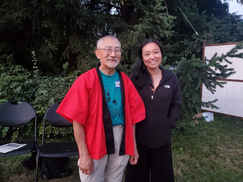 Densho Executive Director Naomi Ostwald Kawamura poses for a photo with From Hiroshima to Hope organizer Stan Shikuma.