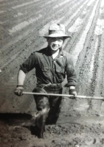 Bob Sakata as a young farmer in Colorado. Photo courtesy of The Produce News.