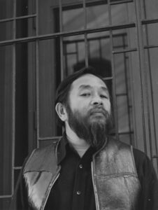 Shig Murao in his Royal Air Force exercise vest. Photographer unknown, courtesy of ShigMurao.org.