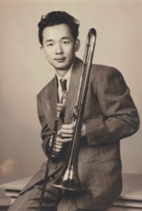 Harry Kitano with his trombone. C. 1940s. Courtesy of the Kitano Family.