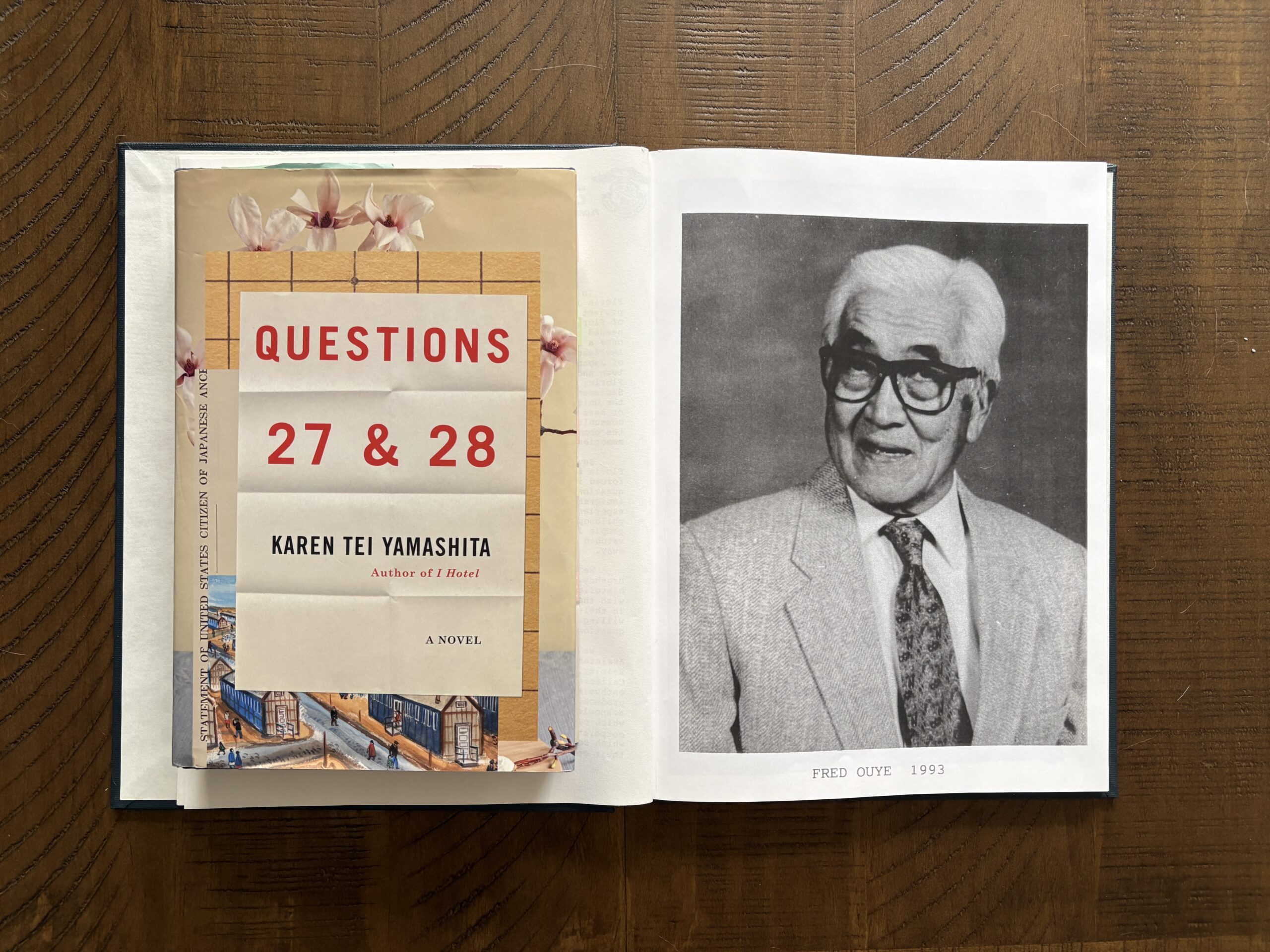 Karen Tei Yamashita's novel, “Questions 27 & 28” next to photo of blog writer Amber Hisatomi's great-grandfather